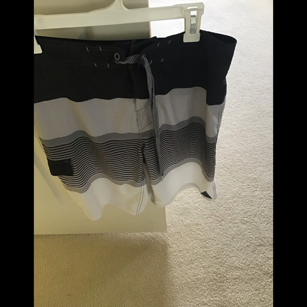 Men’s black and white striped board shorts